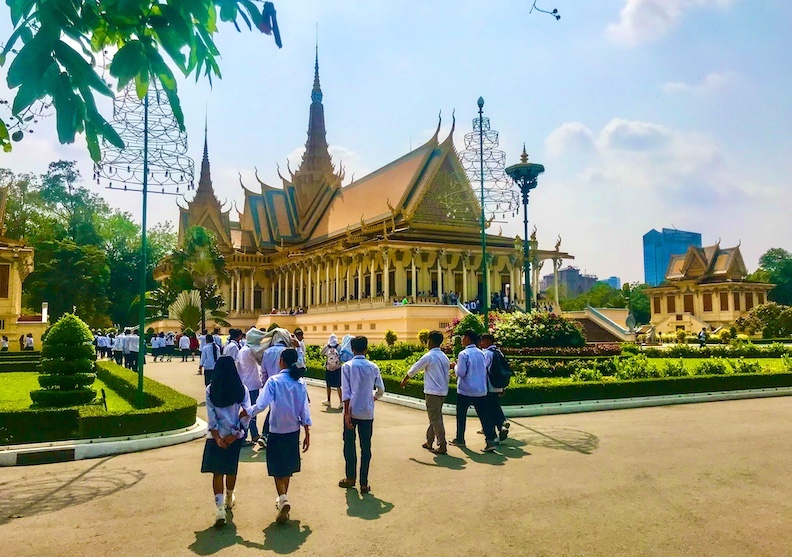 High-school students arrive to tour Cambodia’s Royal Palace, built in 1866 as the residence of the kingdom’s royal family. 