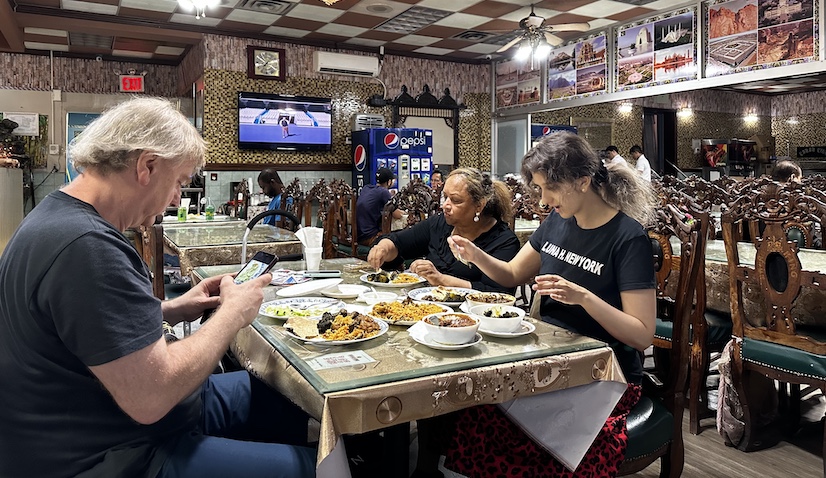 Customers enjoying a meal at Kabab King.