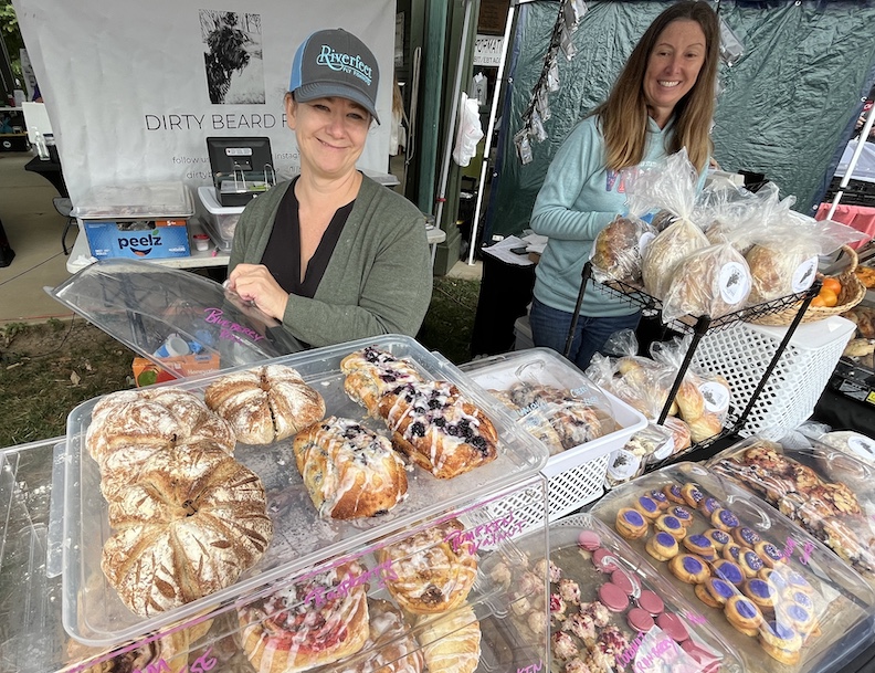 Bakers offer their fresh bread (and cakes and cookies) at the Abingdon Va. farmers market.