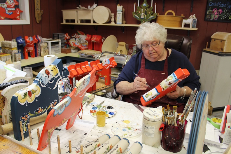 Swedish folk art, including Dala horses, is made by craftspeople at Hemslöjd, a little factory and gift shop that can be toured in Lindsborg, Kansas.