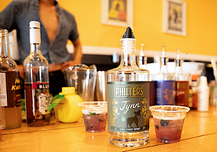 Philters Distilling produces four nonalcoholic spirits spelled Whiski, Ruhm, Jynn and Mezkahl. The zero-proof mocktails are flavored by oak chips, chicory, coriander, lemon verbena, lapsang souchong, cinnamon, ginger, and clove.